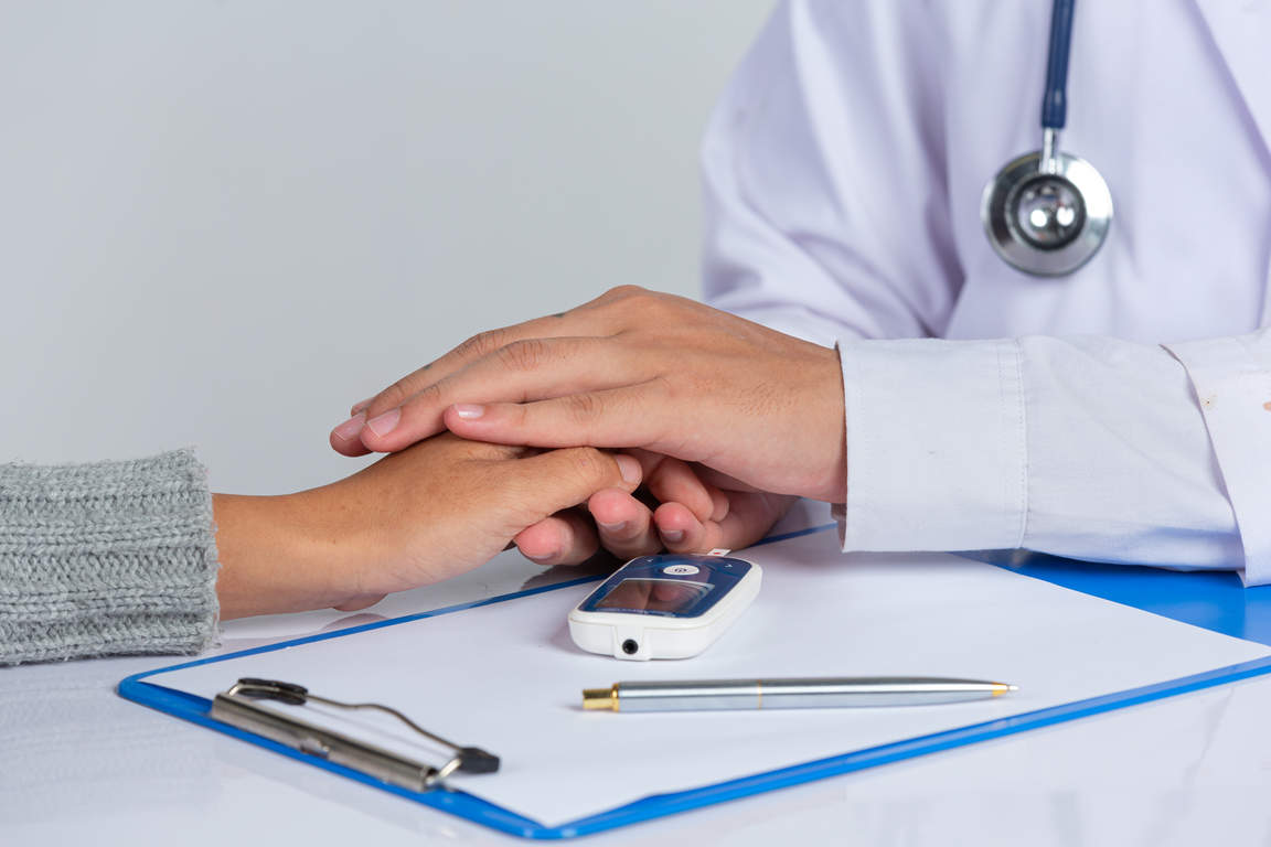 World diabetes day;docter holding patient hand's